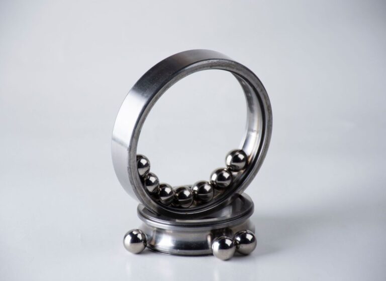 Close-up of a metal ball bearing with polished steel balls